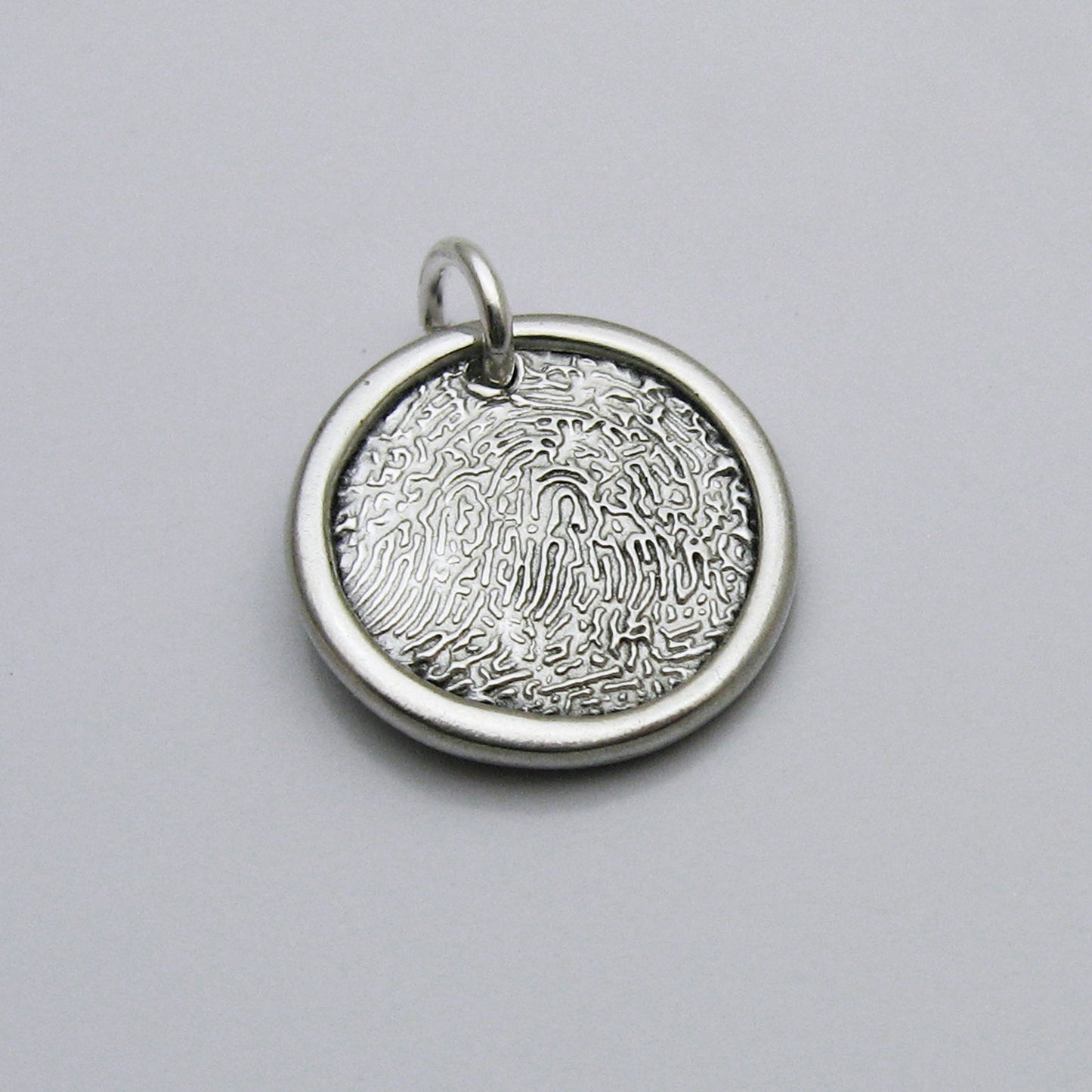 Circle Fingerprint Pendant With Raised Border