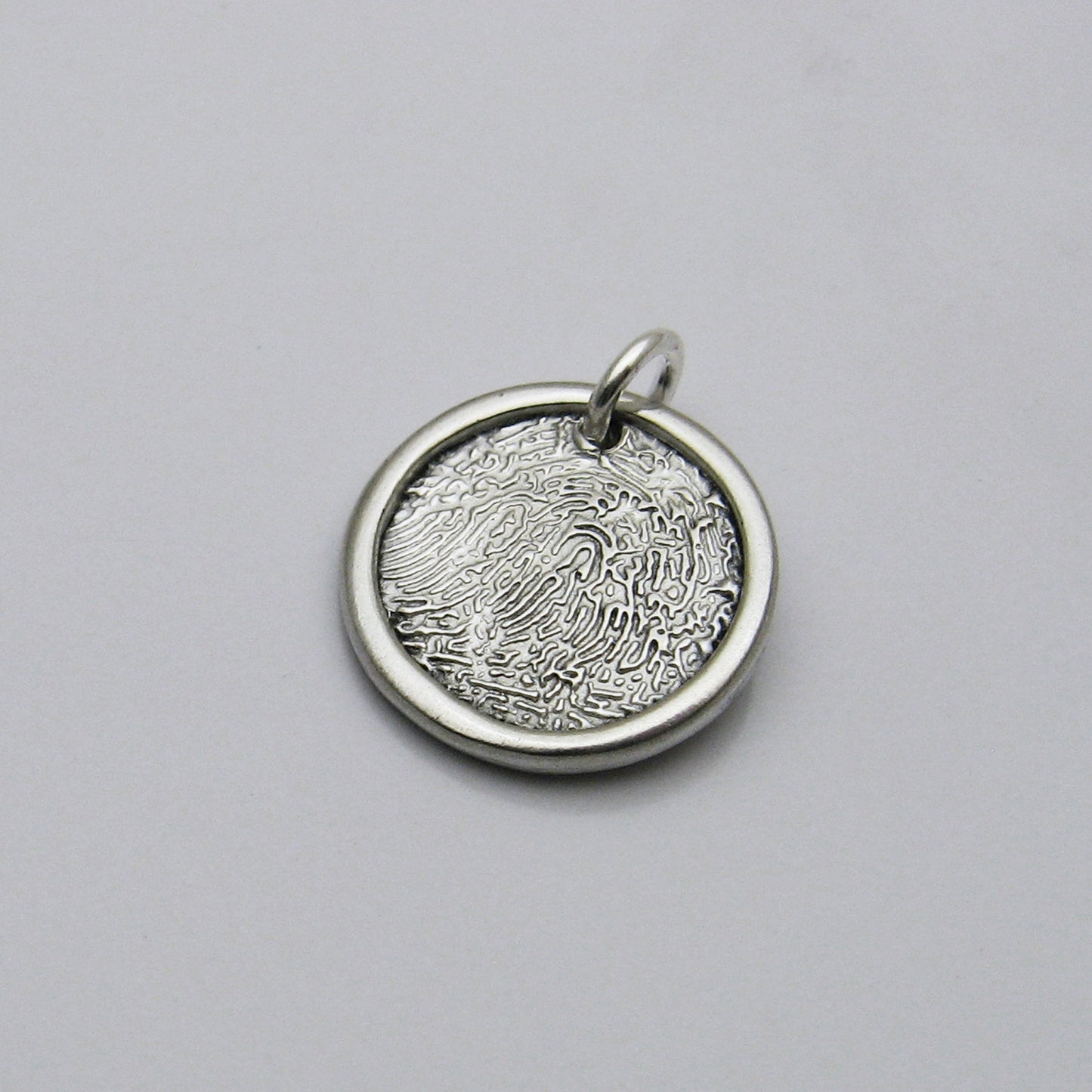 Circle Fingerprint Pendant With Raised Border