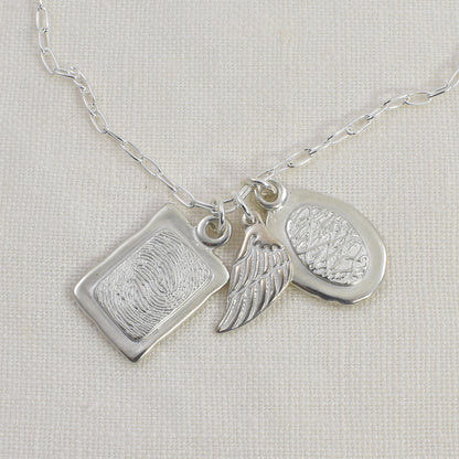 Angel Wing Symbolic Charm Add On Shown on Fingerprint Necklace