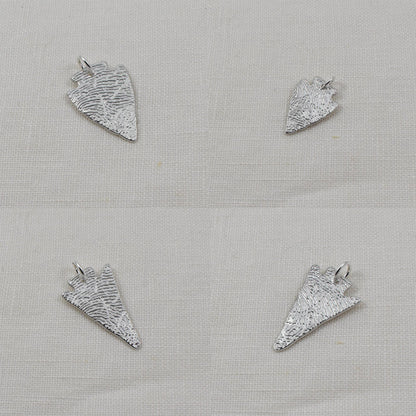 Four Arrowhead Fingerprint Pendants