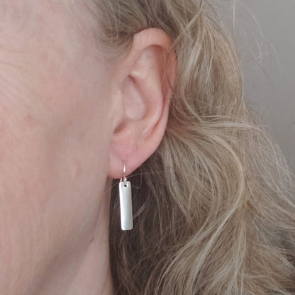 Silver Bar Earrings shown on model