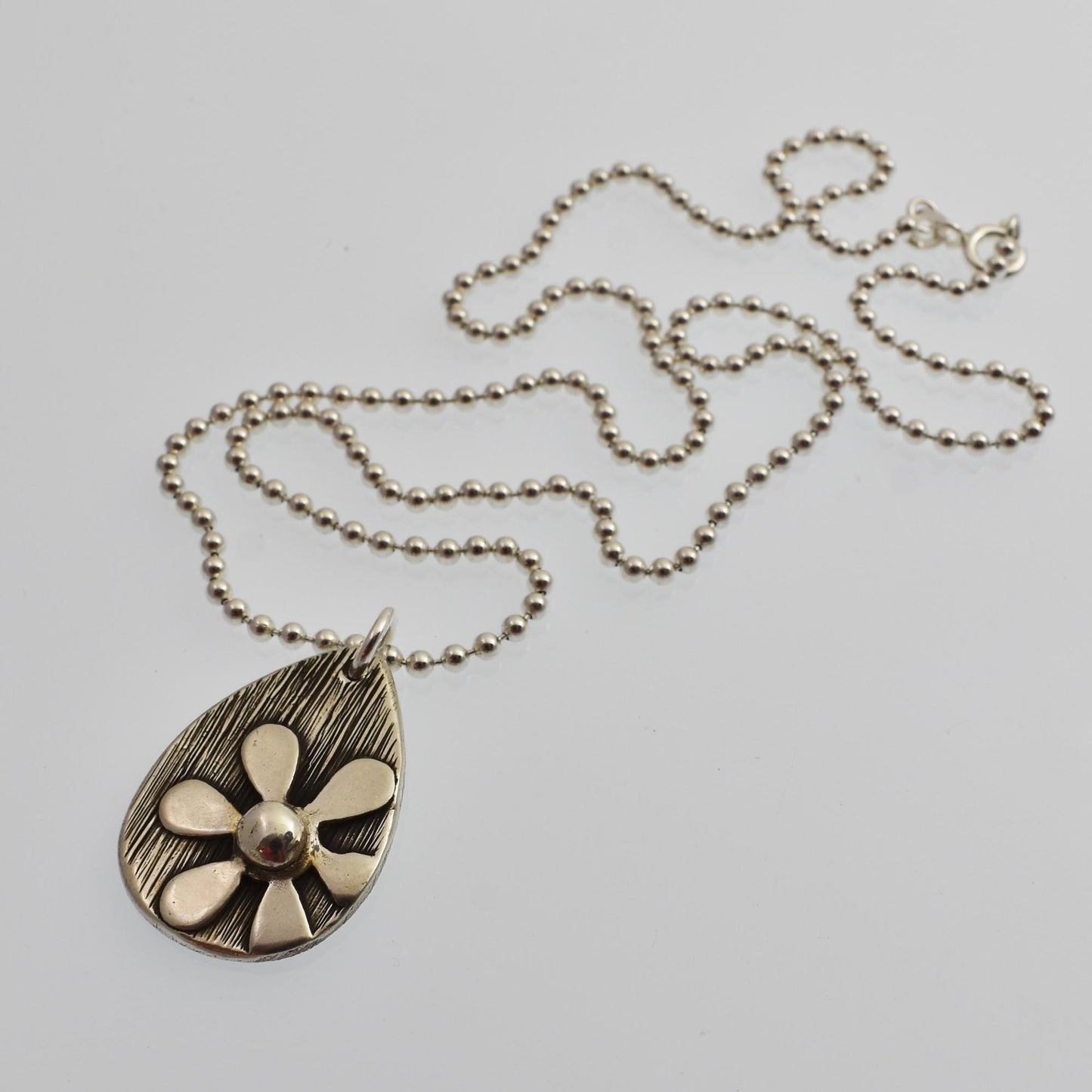 Silver Daisy Flower Teardrop Necklace