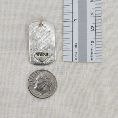 Dog Nose Texture Dog Tag Pendant Shown with Ruler and Dime for Size Reference