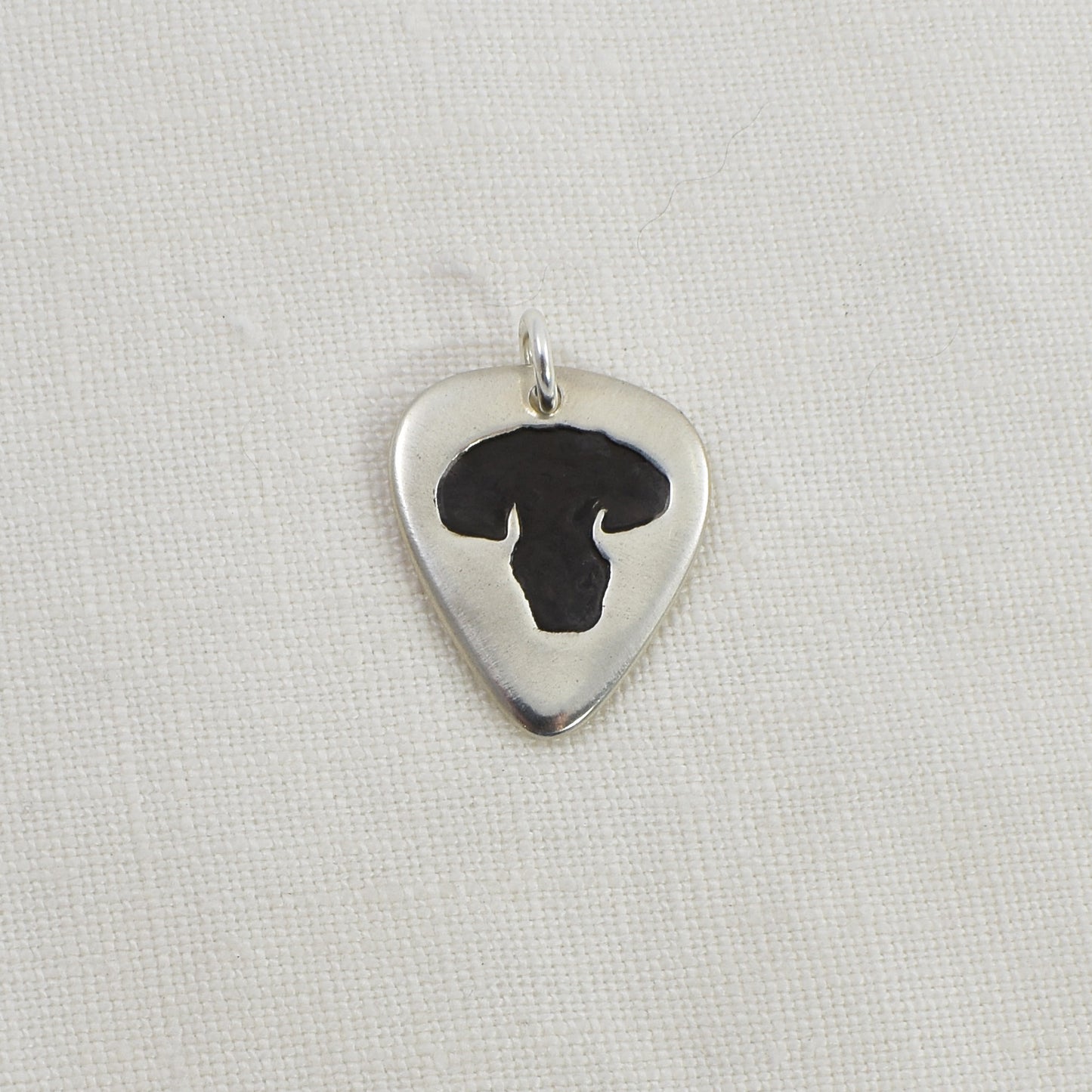Dog Nose Guitar Pick Pendant Example of all black dog nose