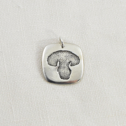 Dog Nose Rounded Square Pendant showing texture as an example