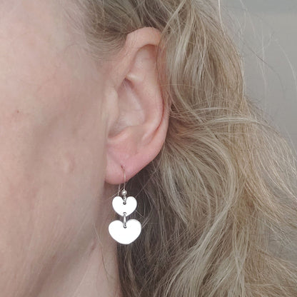 Silver Double Heart Earrings shown on model