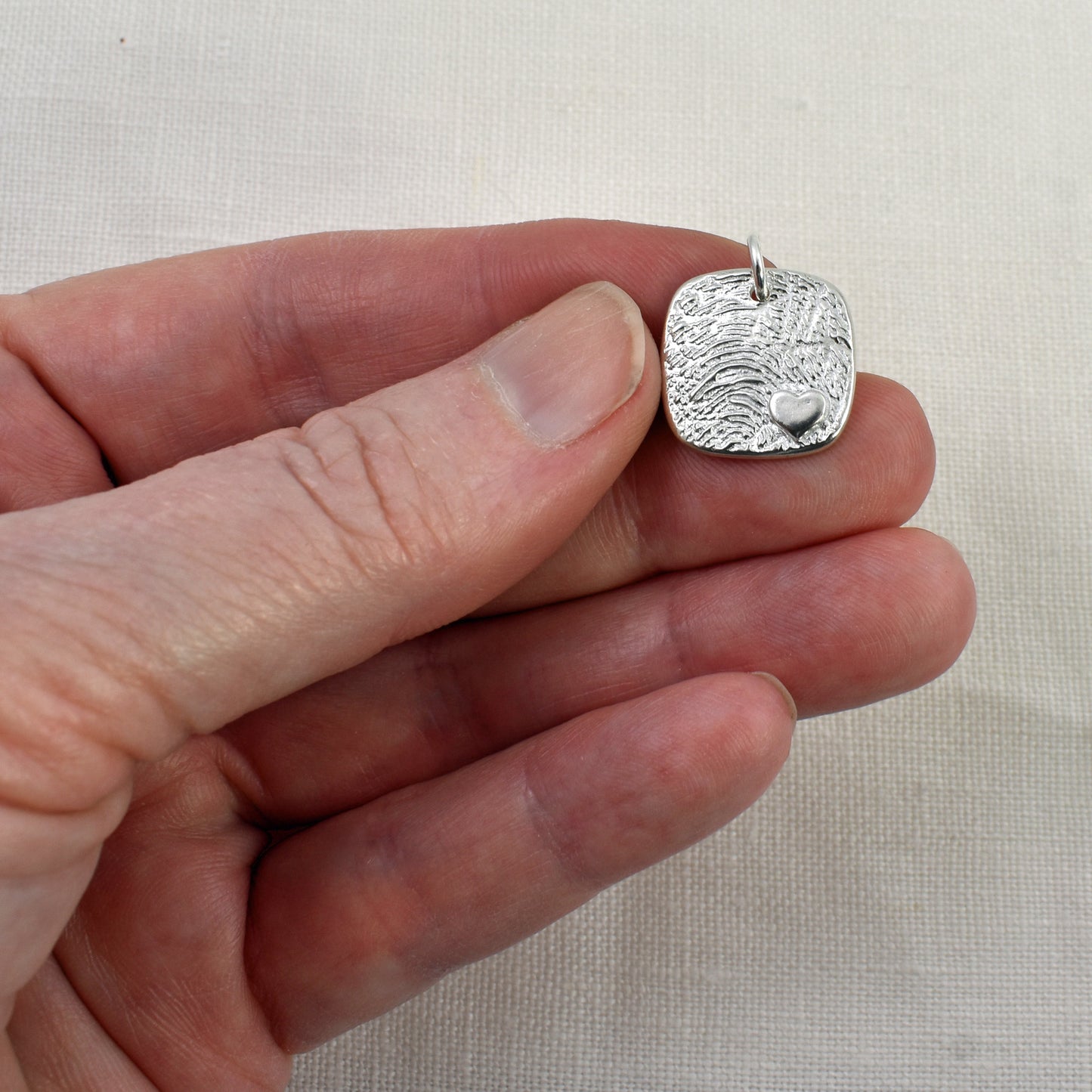 Fingerprint Pendant Embellished with Tiny Heart