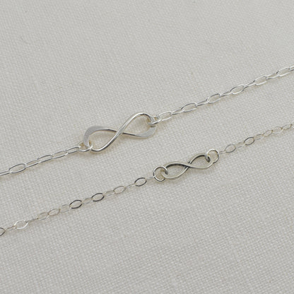 Sterling Silver Infinity Bracelets are shown together in the photo for size reference