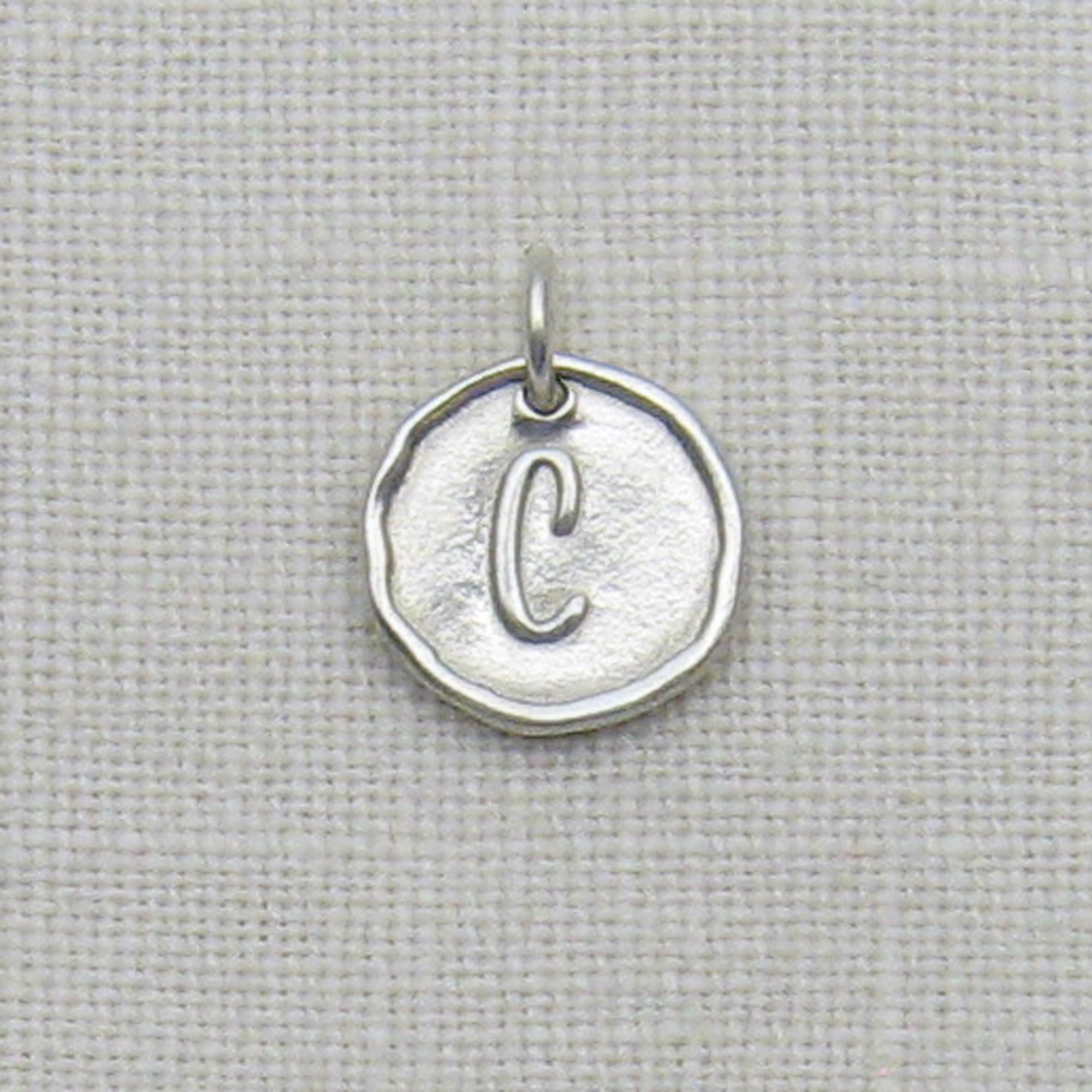 Sterling Silver Embossed Initial Charms – A Timeless Impression