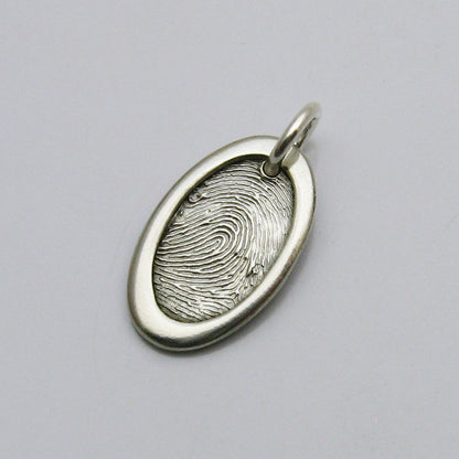 Oval Fingerprint Pendant With Raised Border