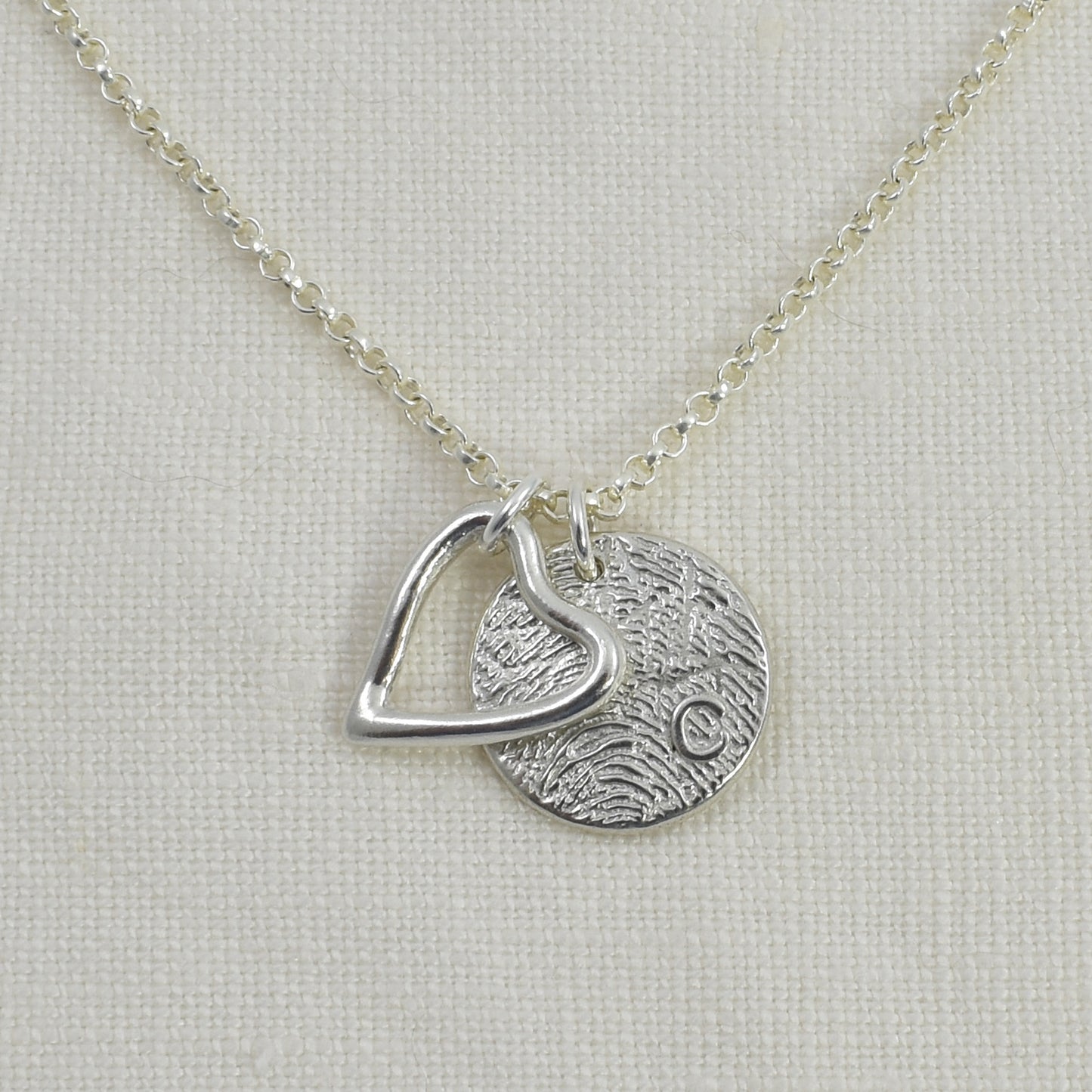 Open Hearts Symbolic Charm Add On Shown on Fingerprint Necklace