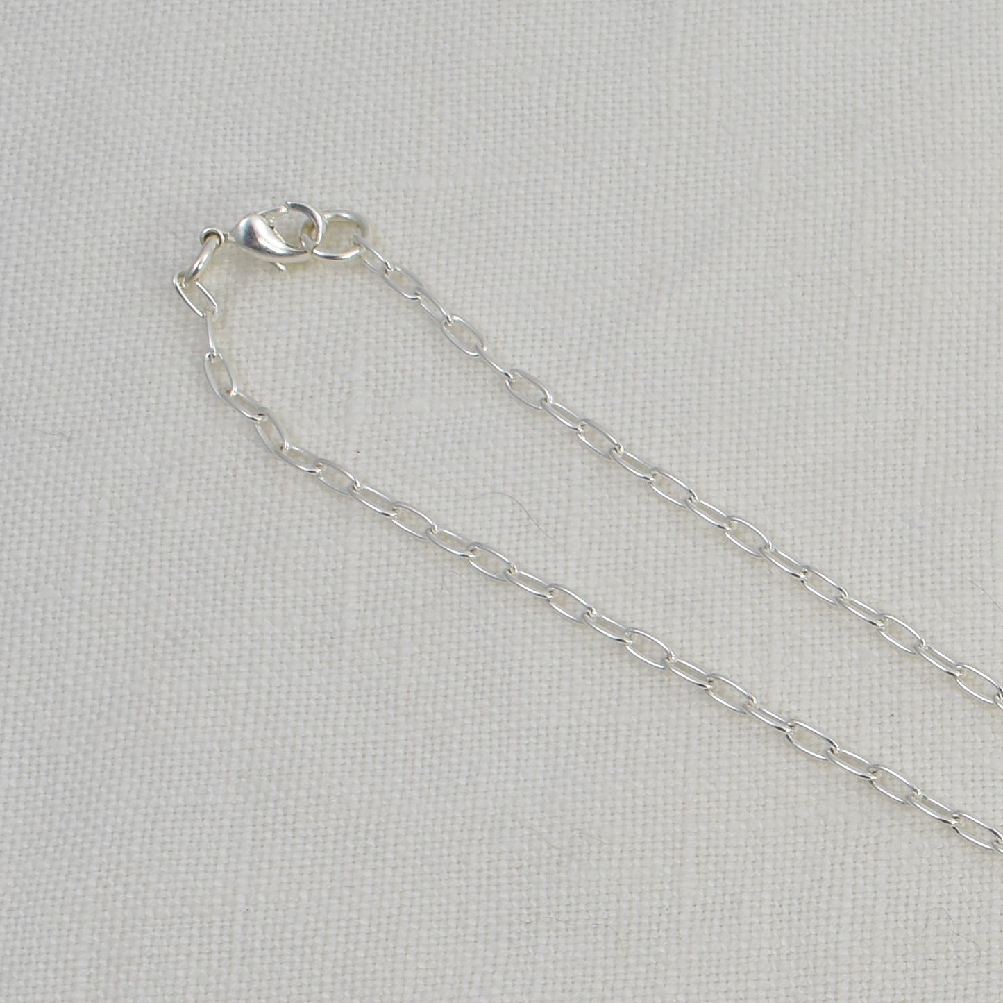 Sterling Silver Paperclip Chain showing the lobster clasp