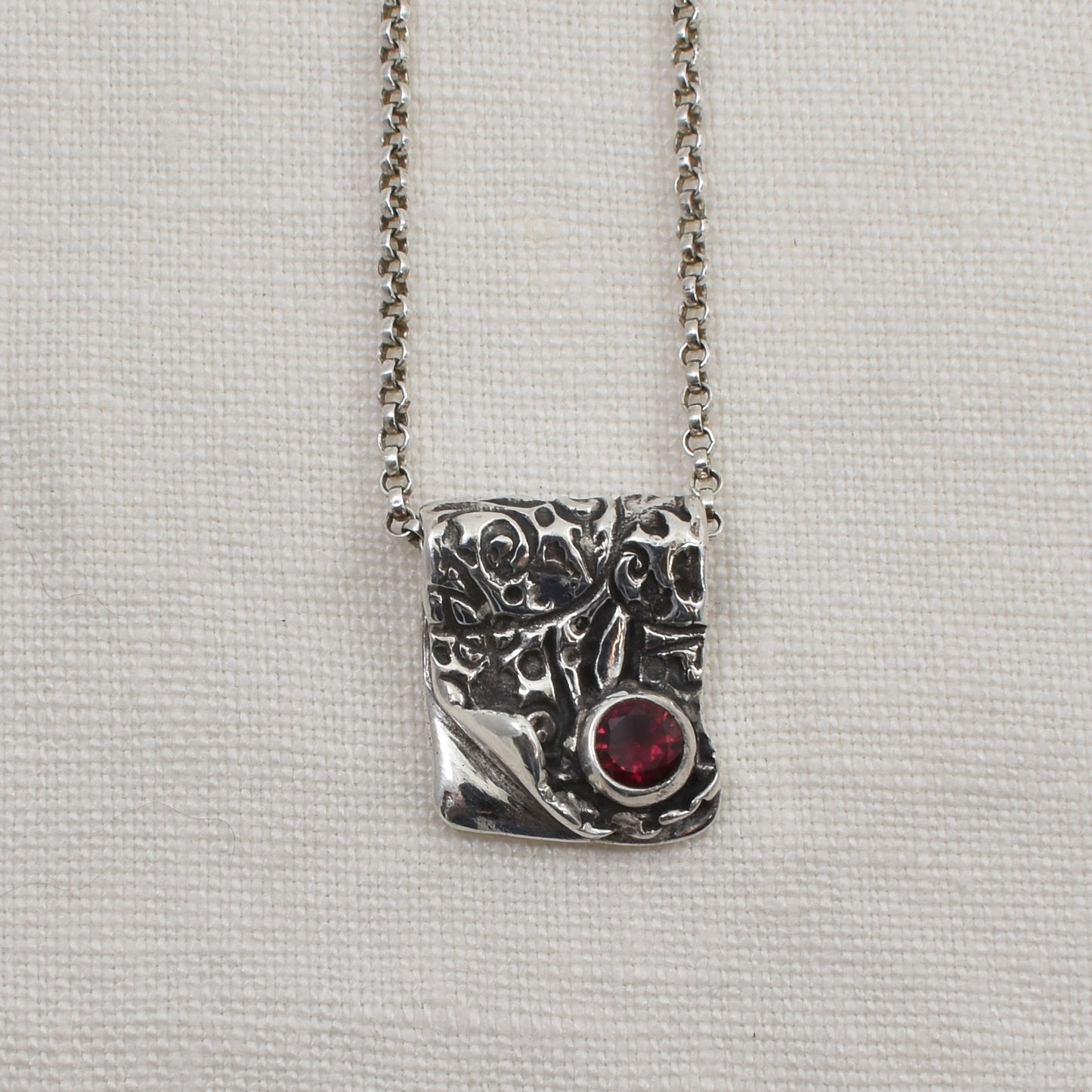 Silver and Ruby Cubic Zirconia Ember Fold Necklace