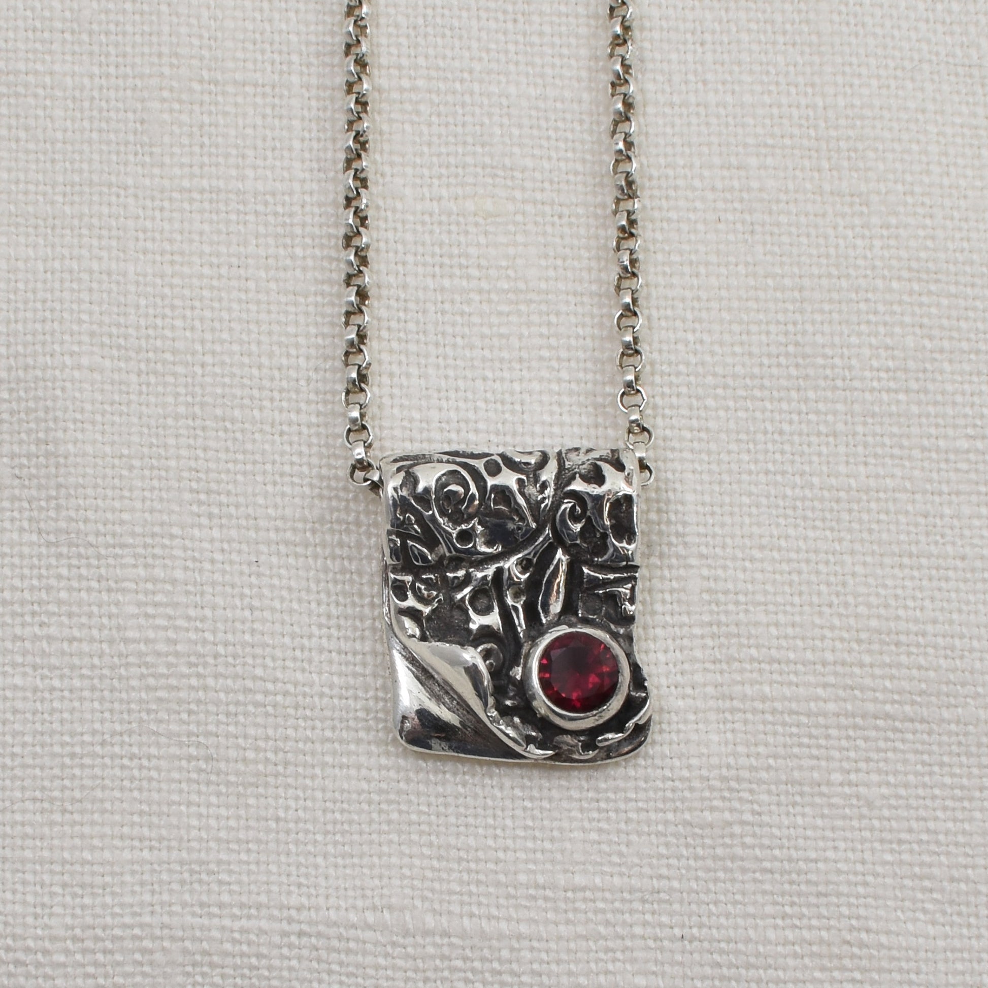 Silver and Ruby Cubic Zirconia Ember Fold Necklace