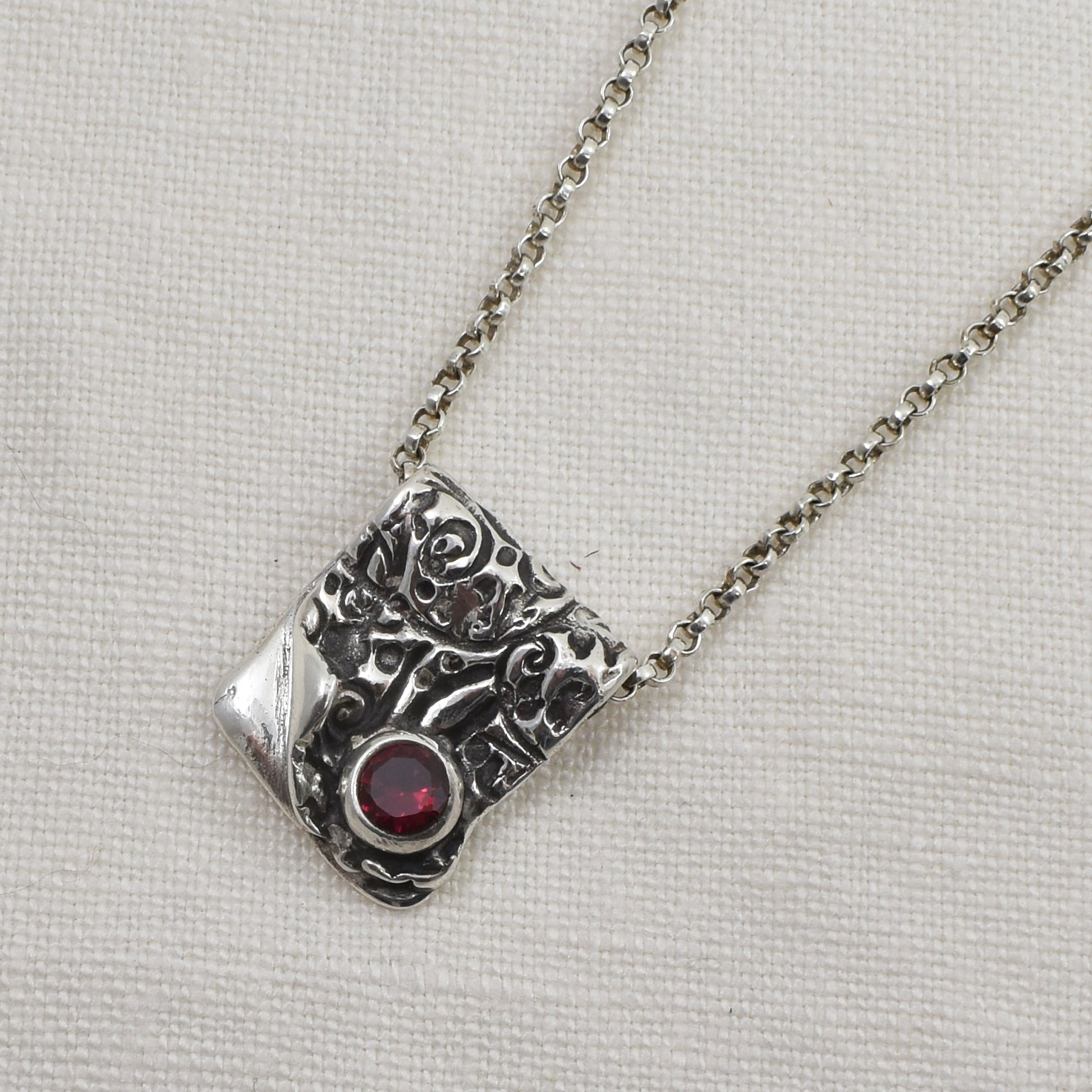 Silver and Ruby Cubic Zirconia Ember Fold Necklace