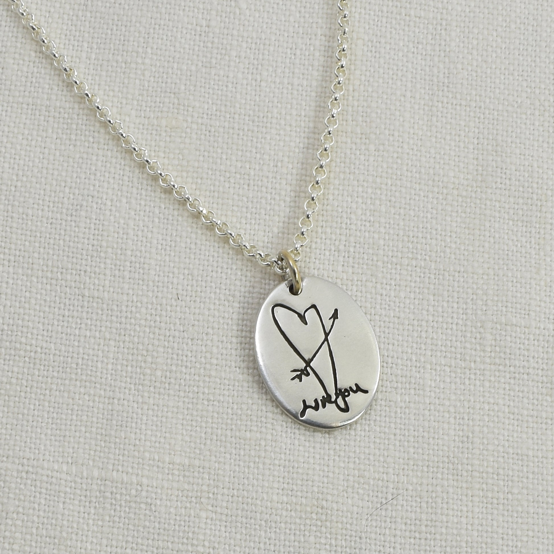 Sterling Silver Oval Pendant Engraved with Handwriting on a sterling silver rolo chain