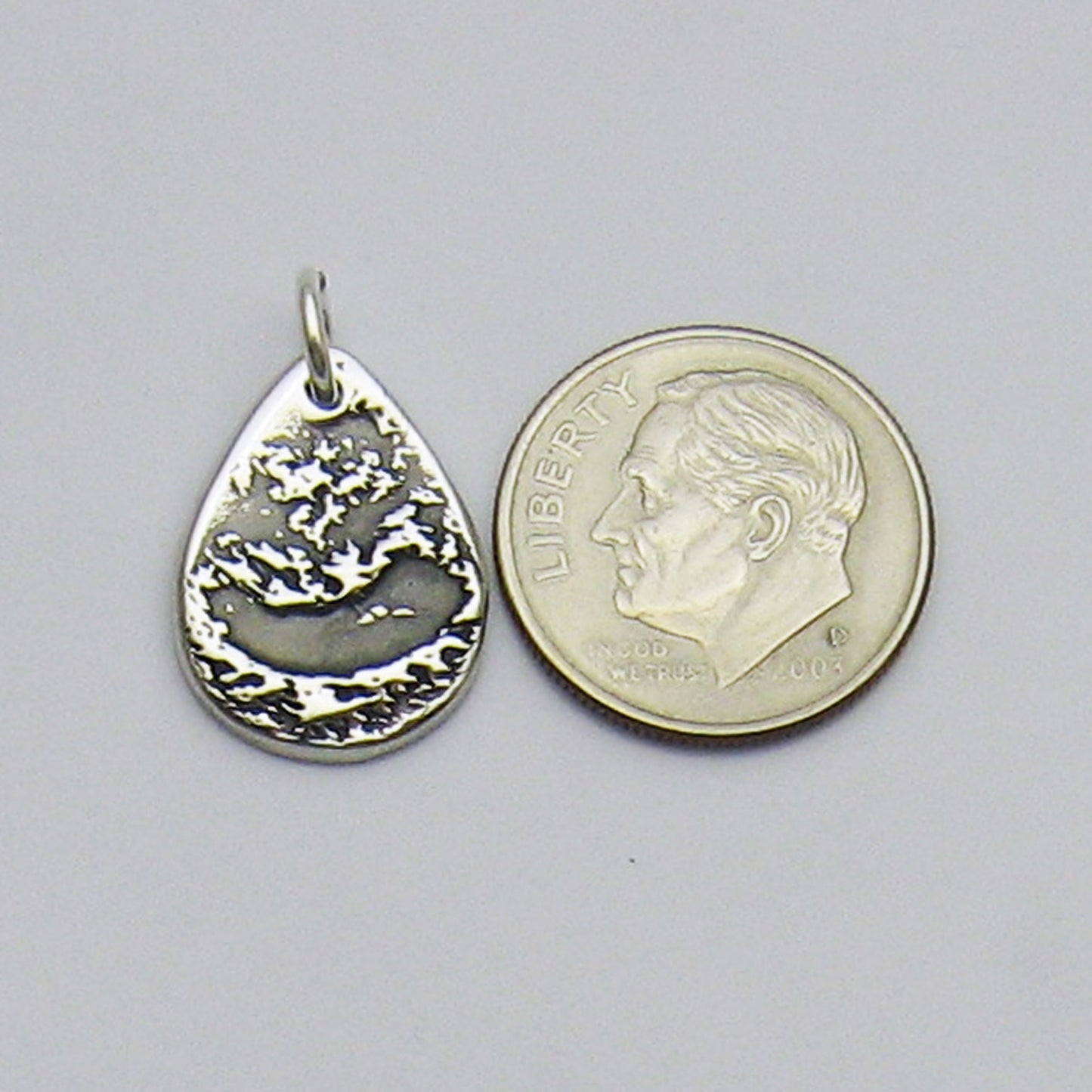 Ultrasound Teardrop Pendant Size Reference with dime